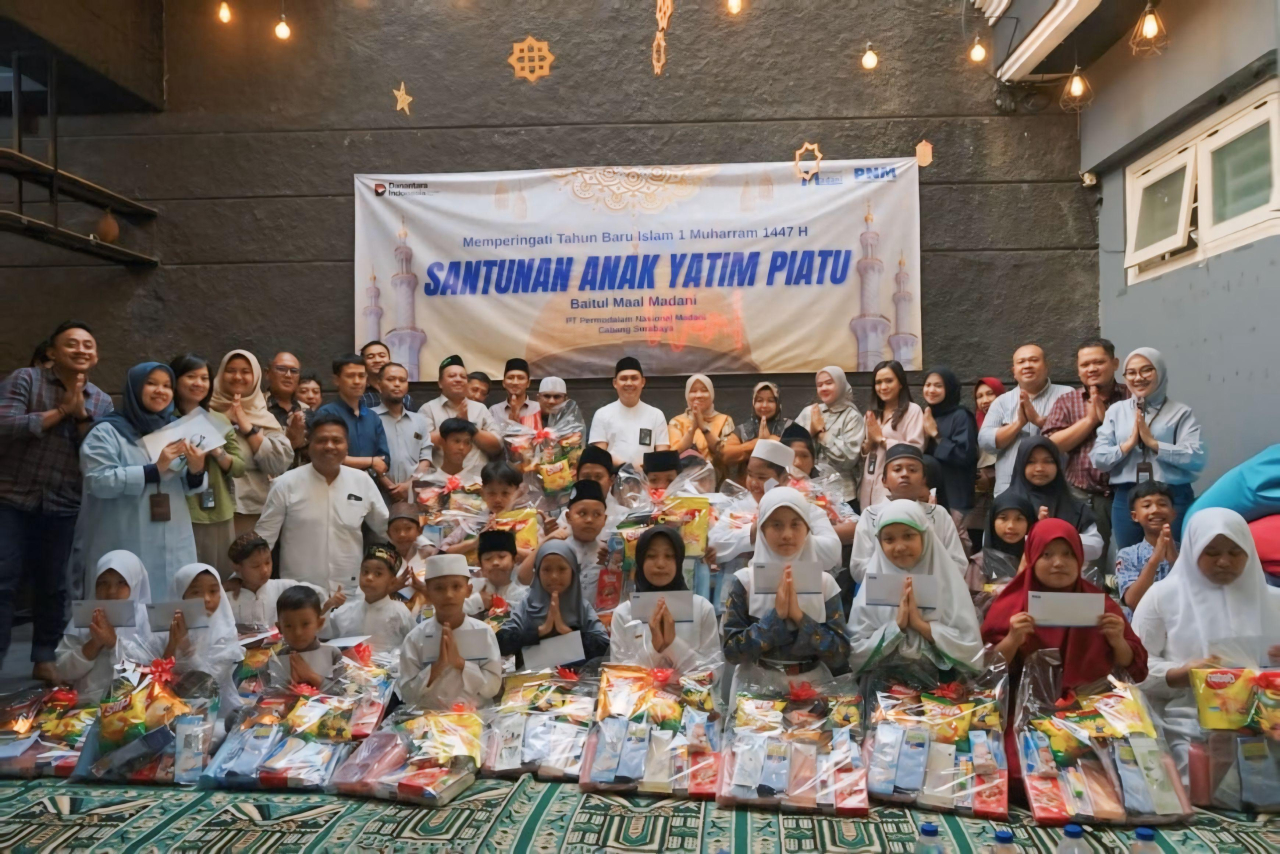 Tebar Kepedulian, PNM Cabang Surabaya Bersama Baitul Maal Madani Hadirkan Santunan bagi Anak Yatim